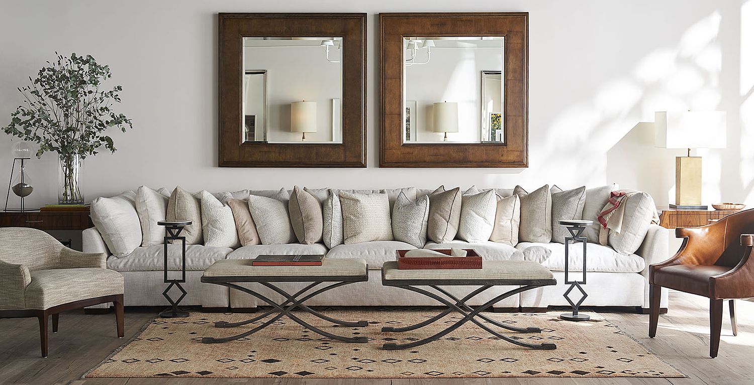 A long sofa made up of elements of a sectional collection.